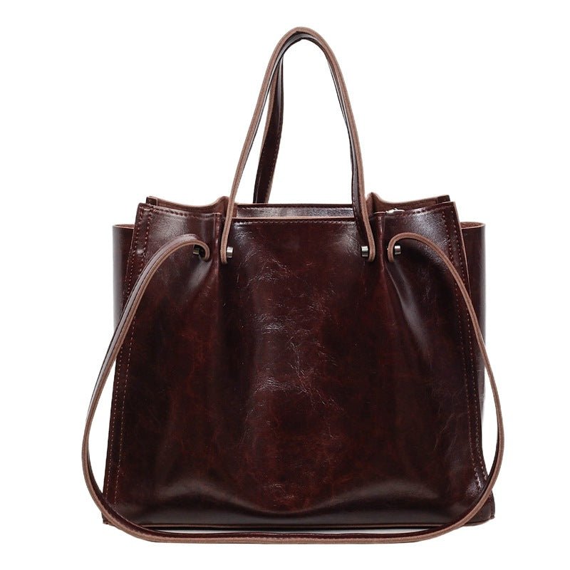 Beverly | Minimalistische Tragetasche aus veganem Leder mit Kontrastnähten 6