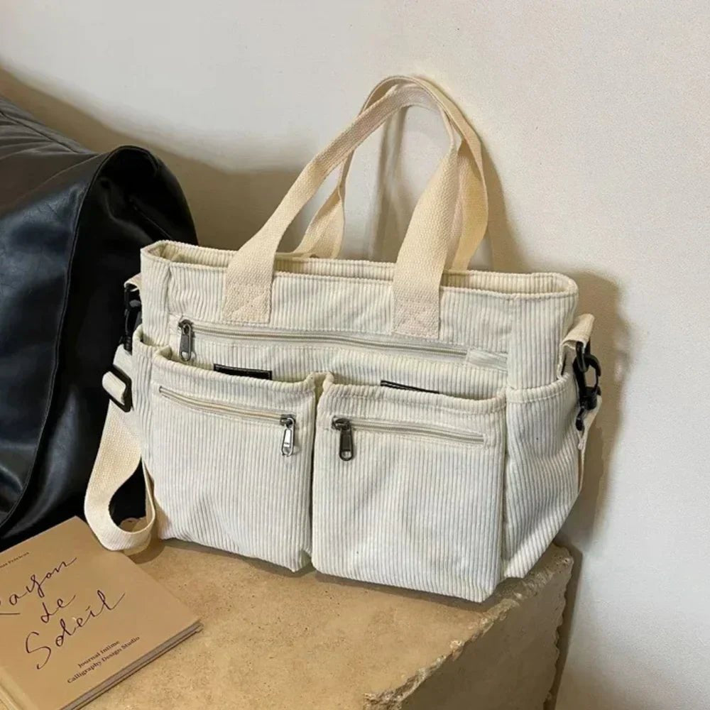 Claire | Cord-Tragetasche mit mehreren Fächern, die sich in eine wandelbare Tasche verwandeln lässt 8
