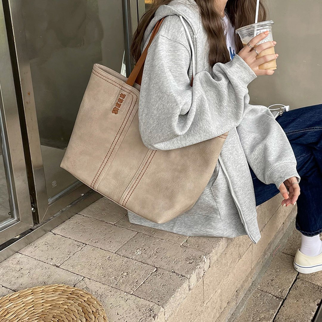 Margaret | Minimalistische Tragetasche aus veganem Leder 1