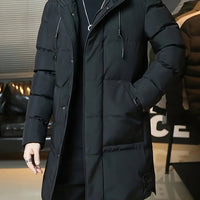 Sebastian | Wärmende und vielseitige Longline Pufferjacke mit Kapuze